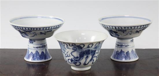 A pair of Chinese blue and white stem bowls, and a further bowl, late 19th / early 20th century, 9.5cm